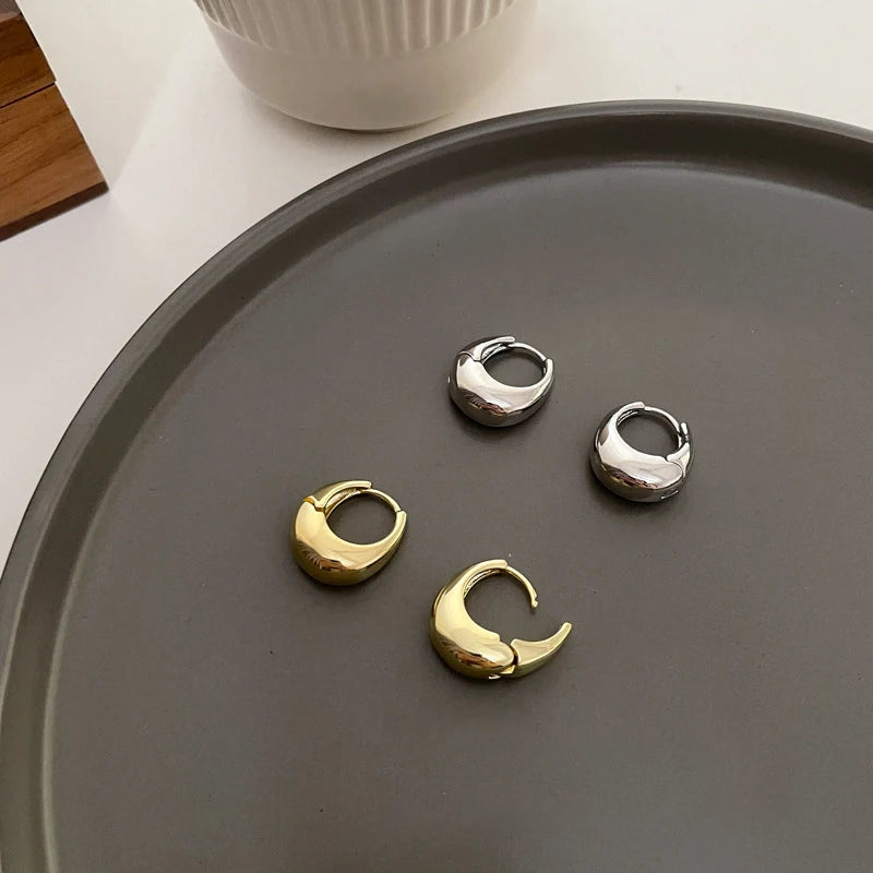 The Obsidian Hoops – Metallic Oval Earrings