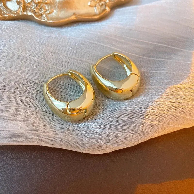 The Obsidian Hoops – Metallic Oval Earrings
