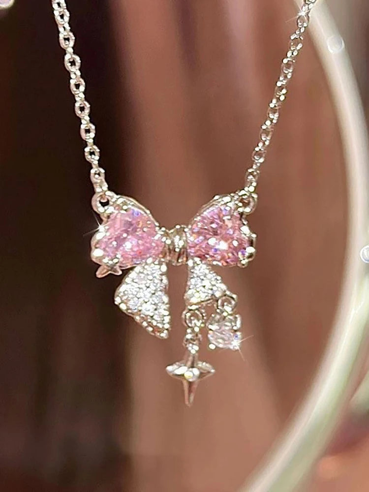 Luxe Pink Bow Pendant Necklace β Dainty Star Detail on Sparkling Chain