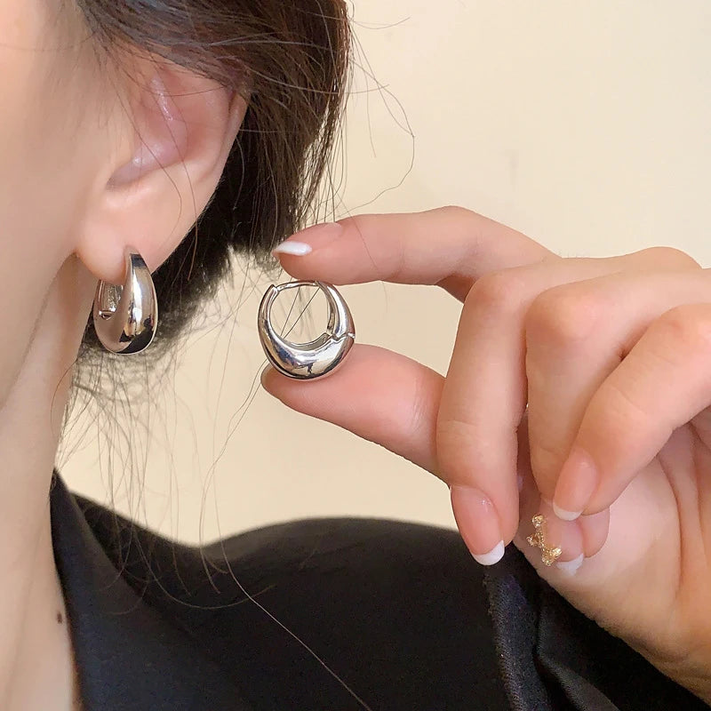 The Obsidian Hoops – Metallic Oval Earrings