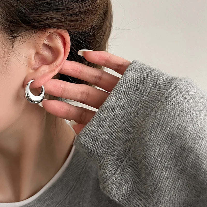 The Obsidian Hoops – Metallic Oval Earrings