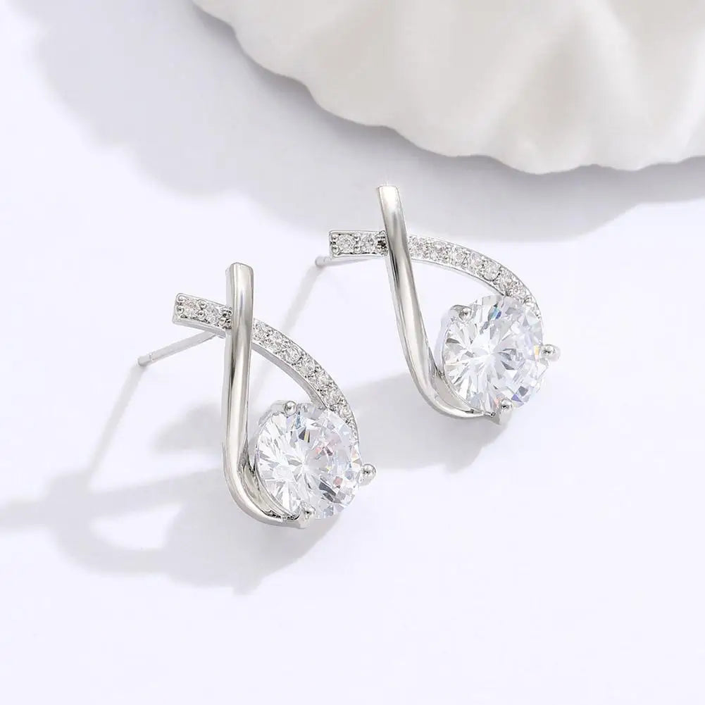 ELEGANT SHINE CROSS STUD Earrings