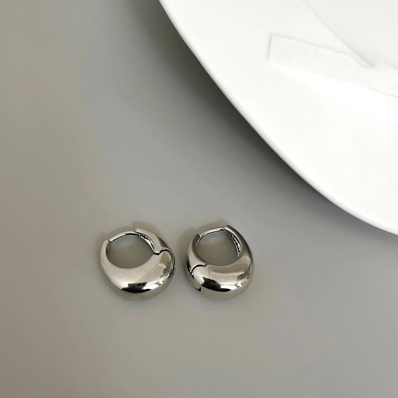 The Obsidian Hoops – Metallic Oval Earrings