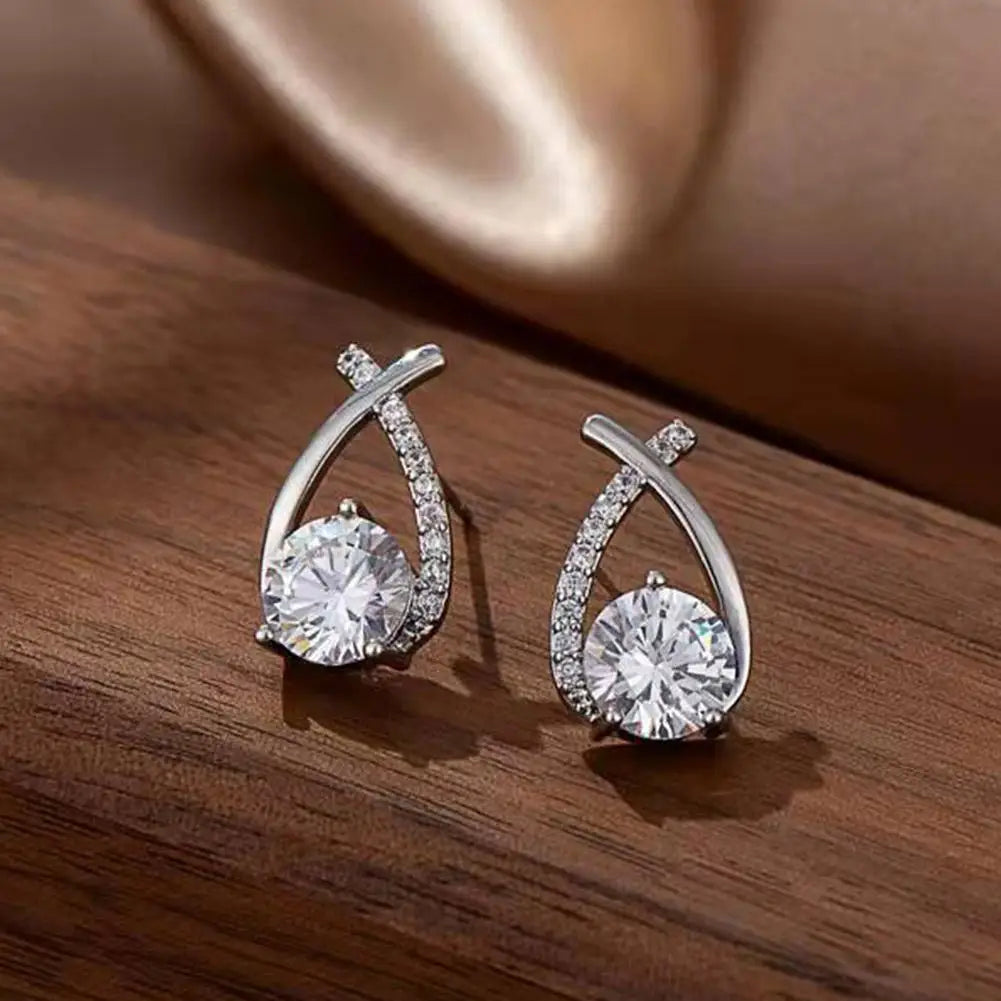 ELEGANT SHINE CROSS STUD Earrings