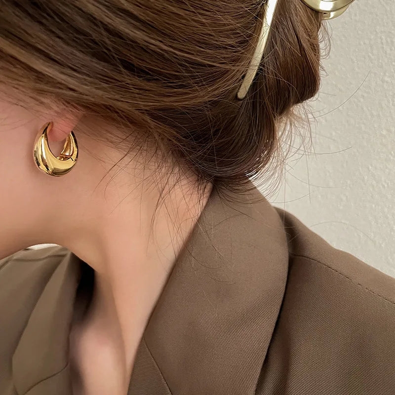 The Obsidian Hoops – Metallic Oval Earrings