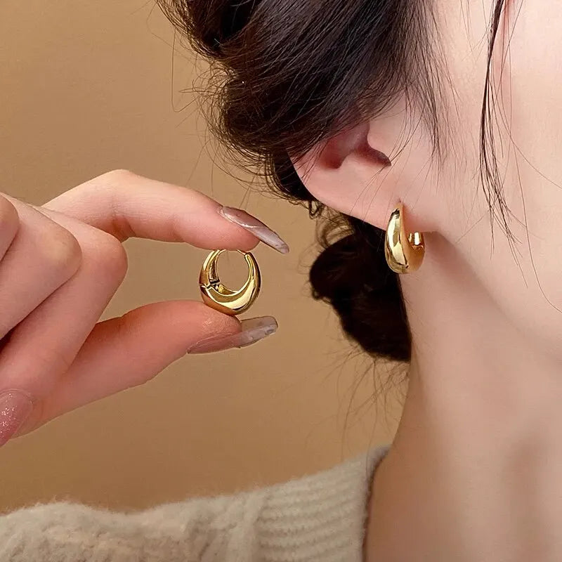 The Obsidian Hoops – Metallic Oval Earrings