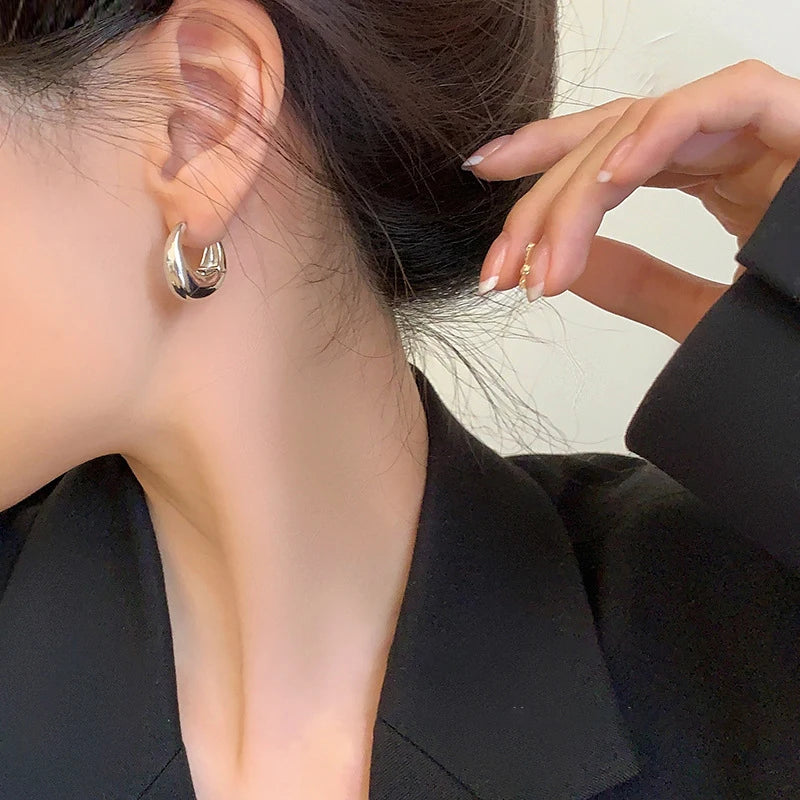 The Obsidian Hoops – Metallic Oval Earrings
