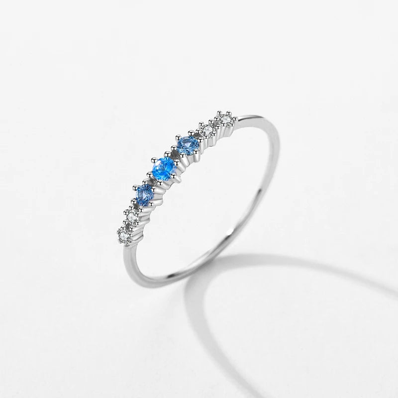 Azure Whisper – Sterling Silver Blue Zirconia Stacking Ring