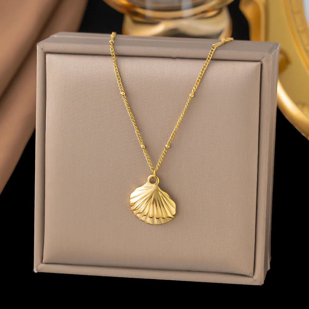 Coastal Charm Necklace – 14K Gold Plated Layers with Starfish, Conch & Pearl Accents