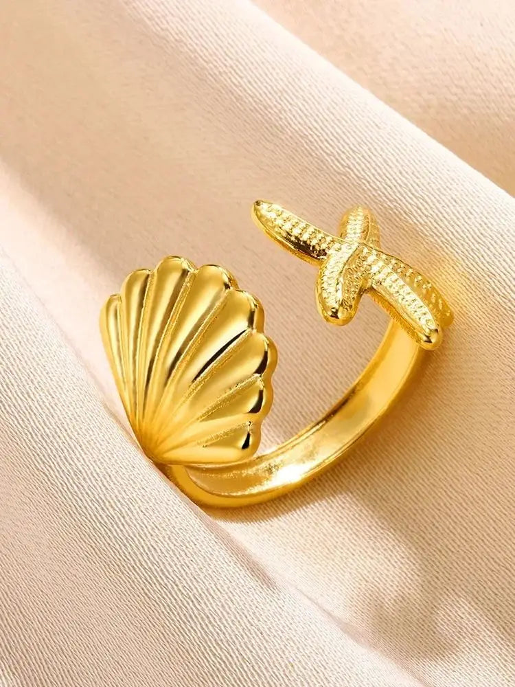 Stella Nova Rings – Adjustable Gold-Tone Stainless Steel with Star & Shell