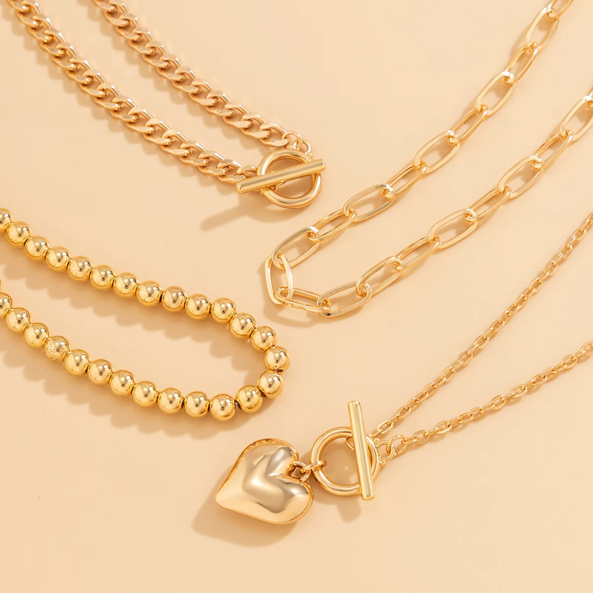 The Rebel Heart Set – 4-Piece Gold-Tone Necklace Collection