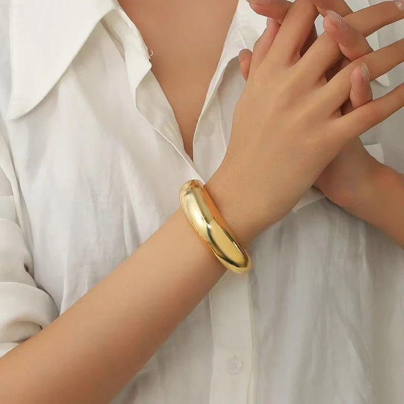 Sculpted Curve Bangle – Bold Irregular Statement Cuff