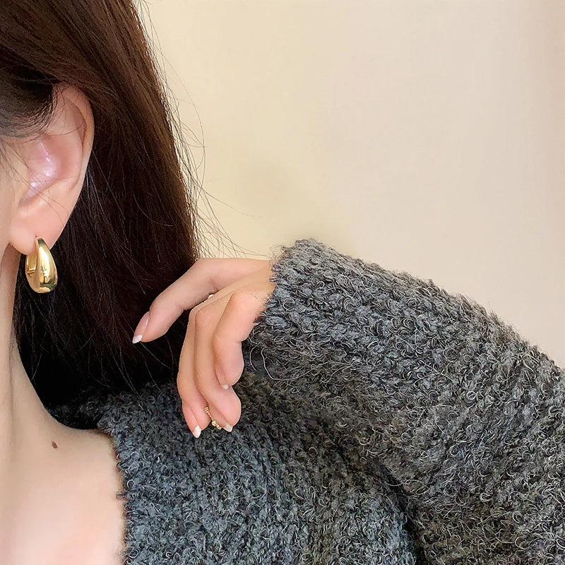 The Obsidian Hoops – Metallic Oval Earrings