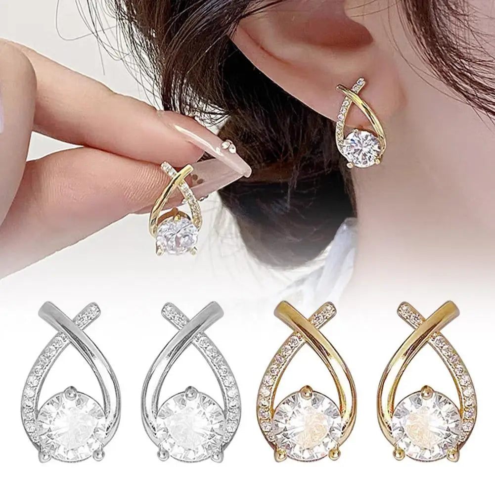 ELEGANT SHINE CROSS STUD Earrings