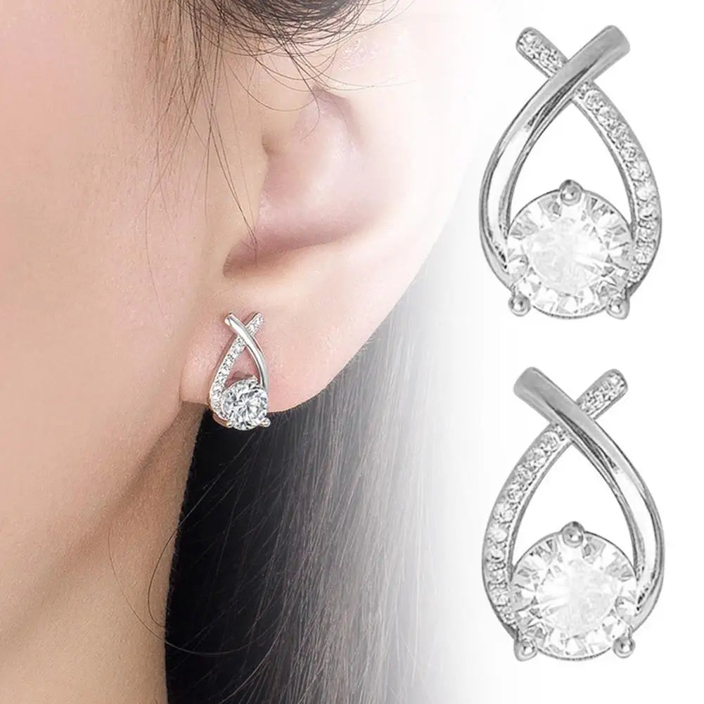 ELEGANT SHINE CROSS STUD Earrings