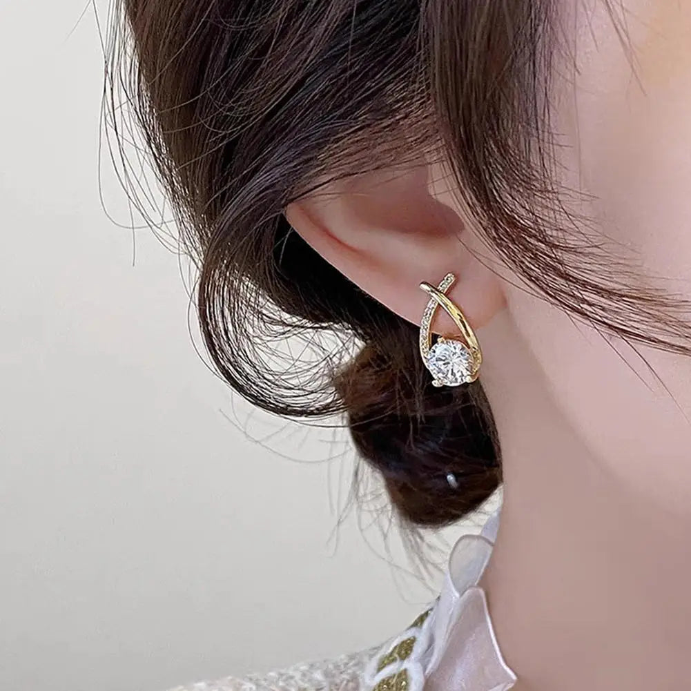 ELEGANT SHINE CROSS STUD Earrings