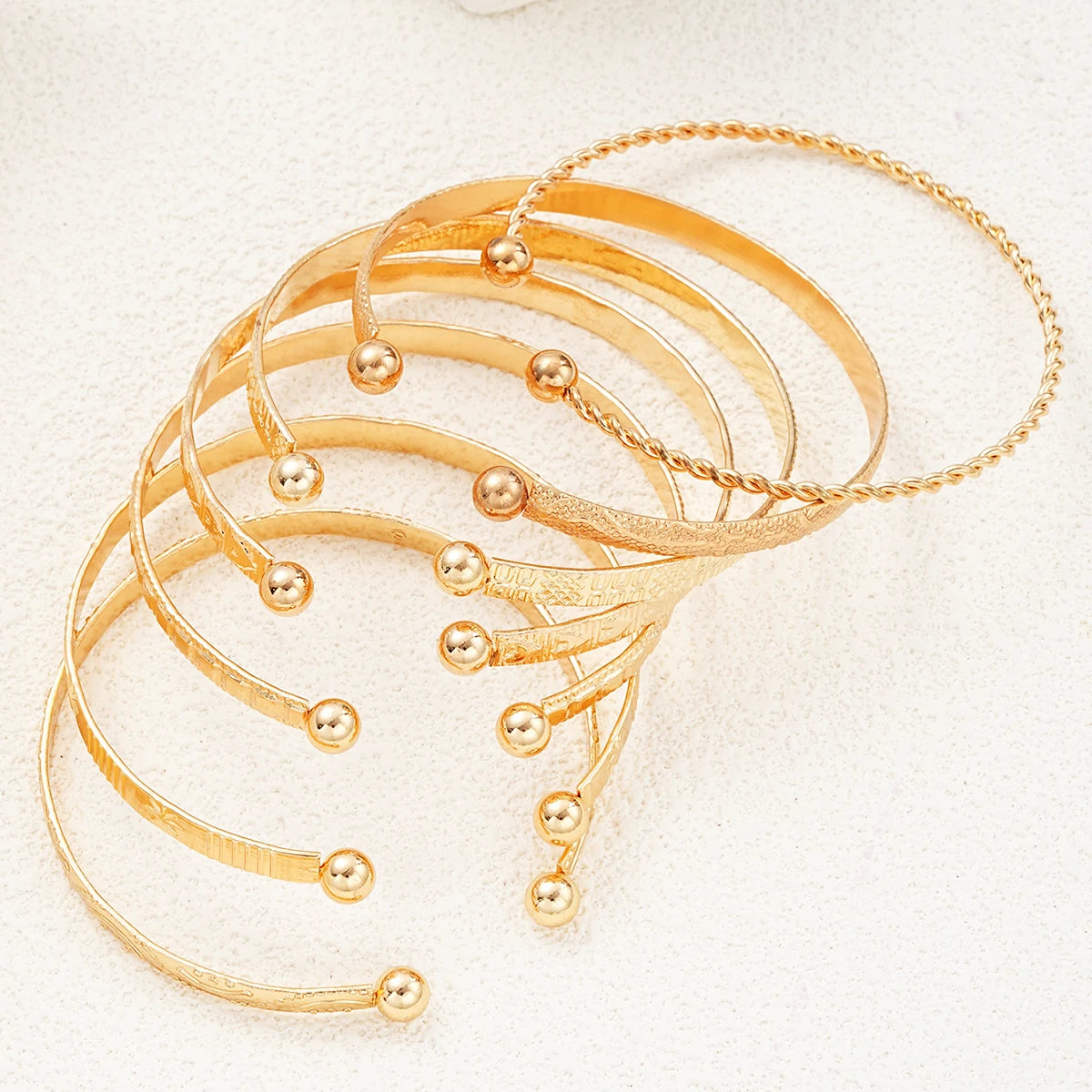 Vesper Edge Set – 7-Piece Gold-Tone Streetwear Bangles