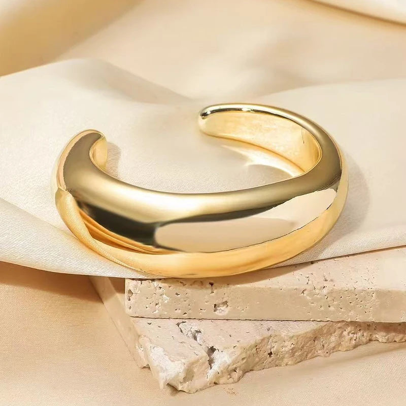 Sculpted Curve Bangle – Bold Irregular Statement Cuff