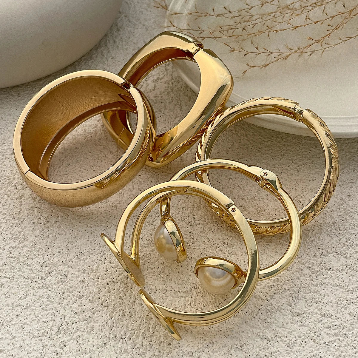 Chunky Gold Spring Bangle – Statement Metal Bracelet