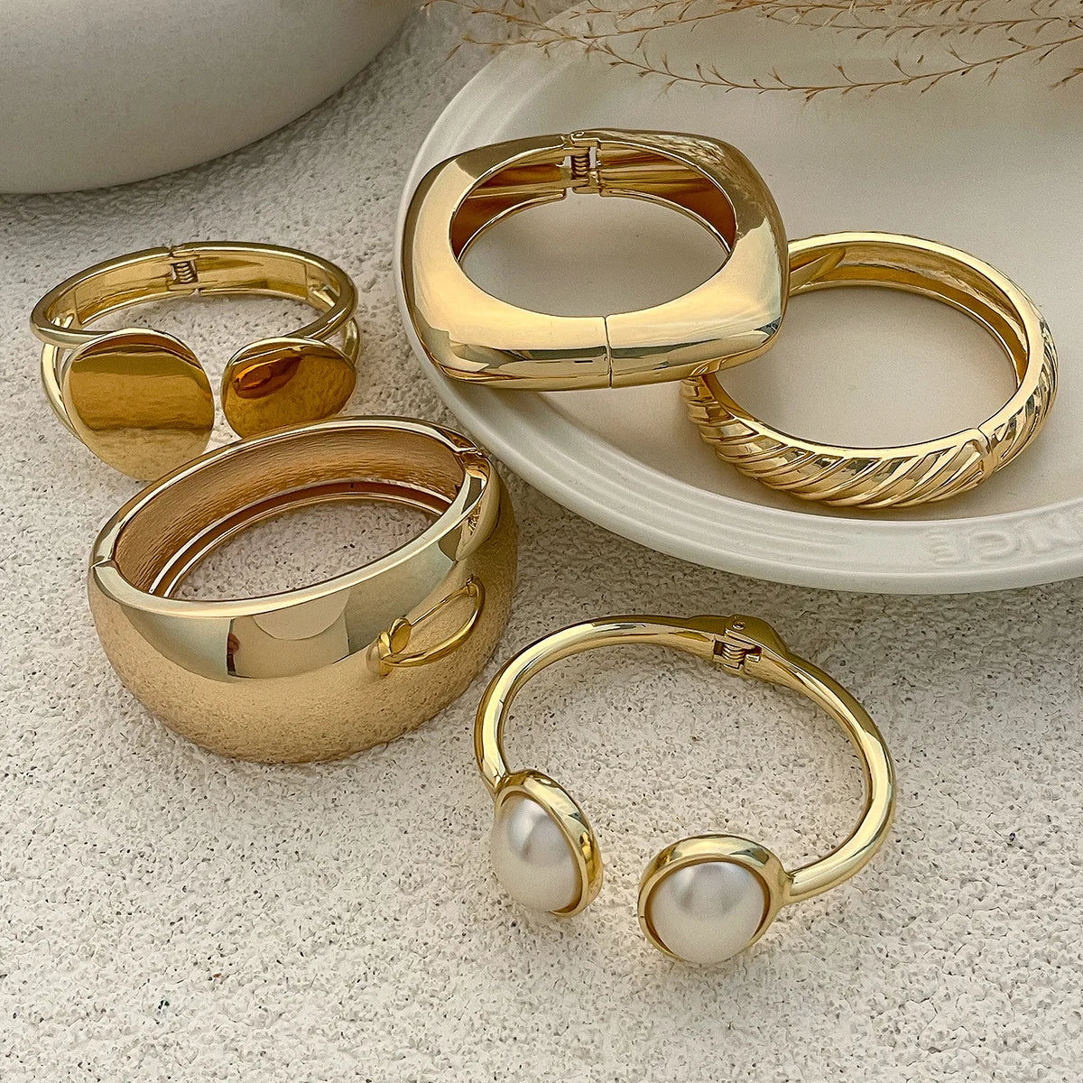 Chunky Gold Spring Bangle – Statement Metal Bracelet