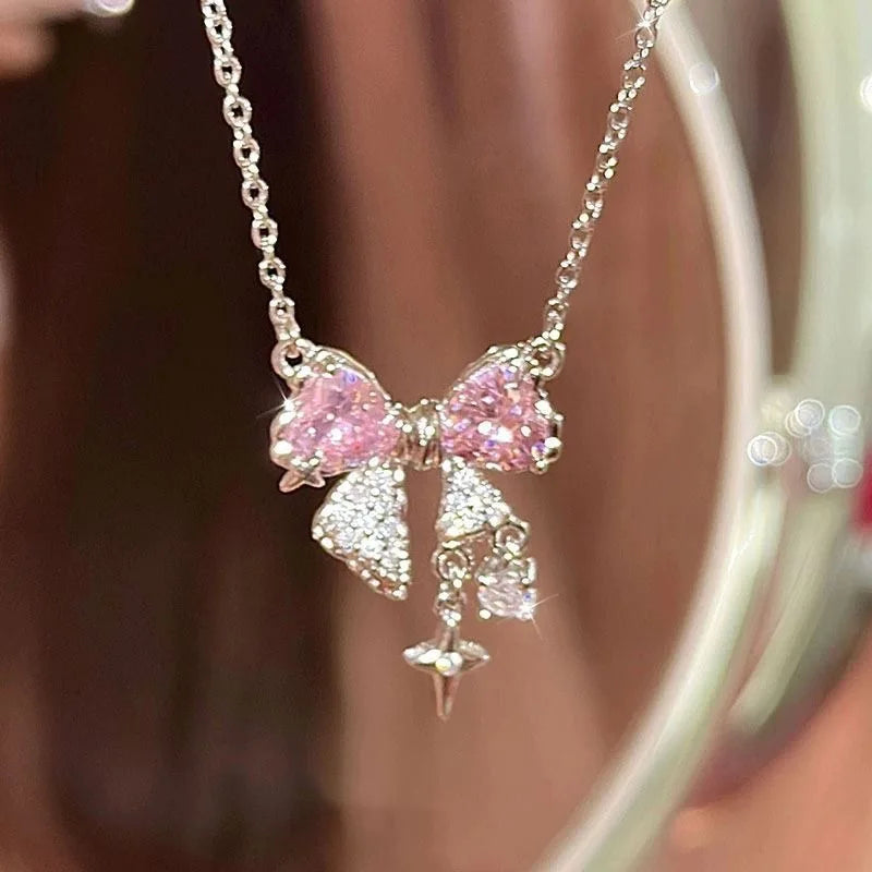 Luxe Pink Bow Pendant Necklace – Dainty Star Detail on Sparkling Chain