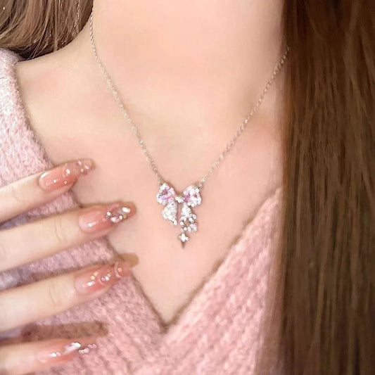 Luxe Pink Bow Pendant Necklace – Dainty Star Detail on Sparkling Chain