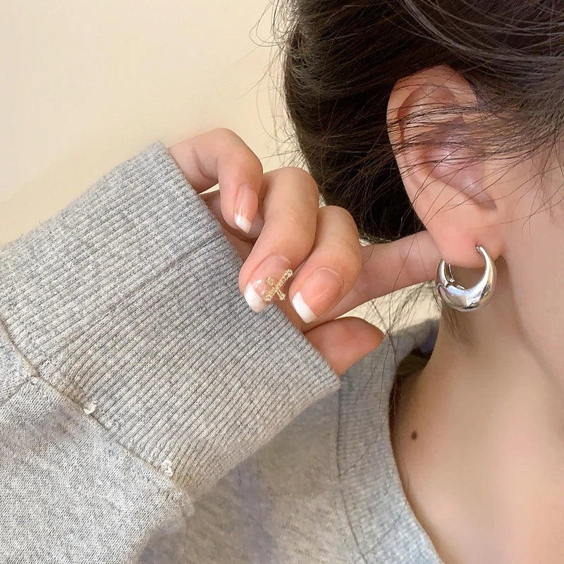 The Obsidian Hoops – Metallic Oval Earrings