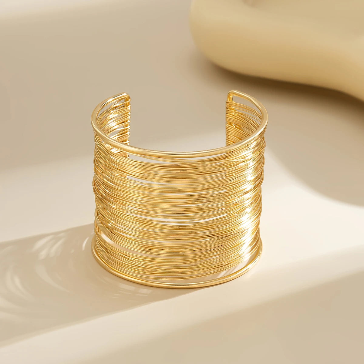 Vortex Wire Bracelet – Luxe Open Cuff Design