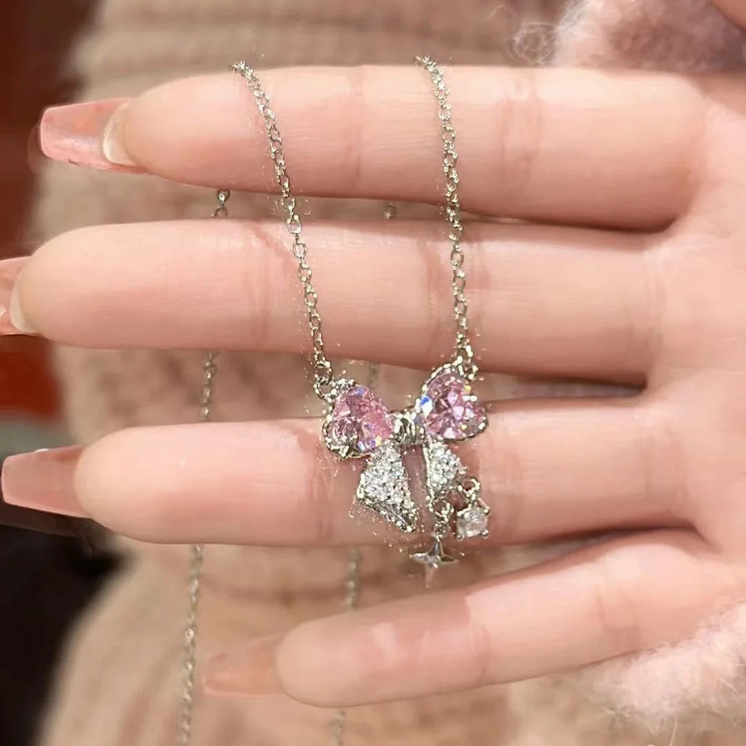 Luxe Pink Bow Pendant Necklace – Dainty Star Detail on Sparkling Chain