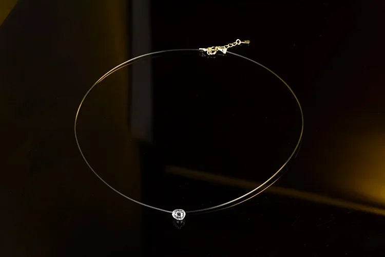 Sterling Silver Floating Necklace – Transparent Chain with Diamond-Like Zircon Pendant