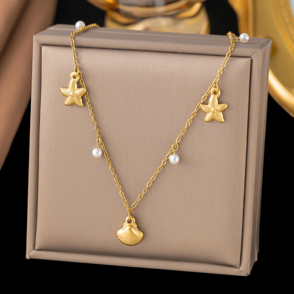 Coastal Charm Necklace – 14K Gold Plated Layers with Starfish, Conch & Pearl Accents