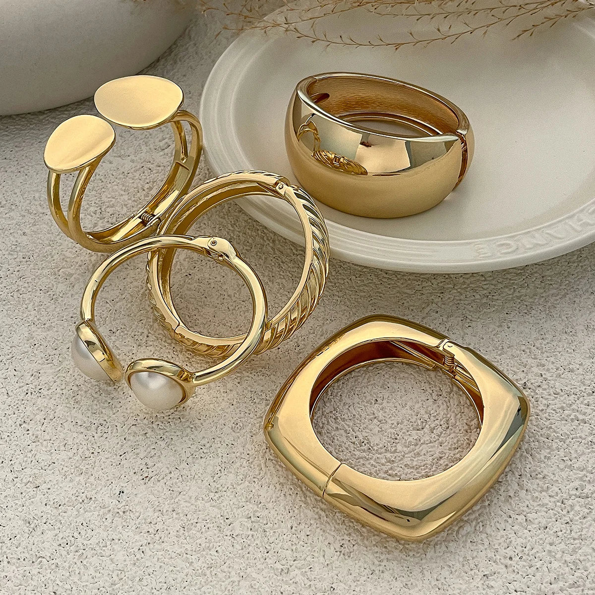 Chunky Gold Spring Bangle – Statement Metal Bracelet