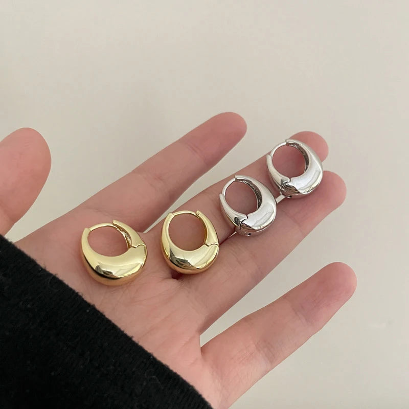 The Obsidian Hoops – Metallic Oval Earrings