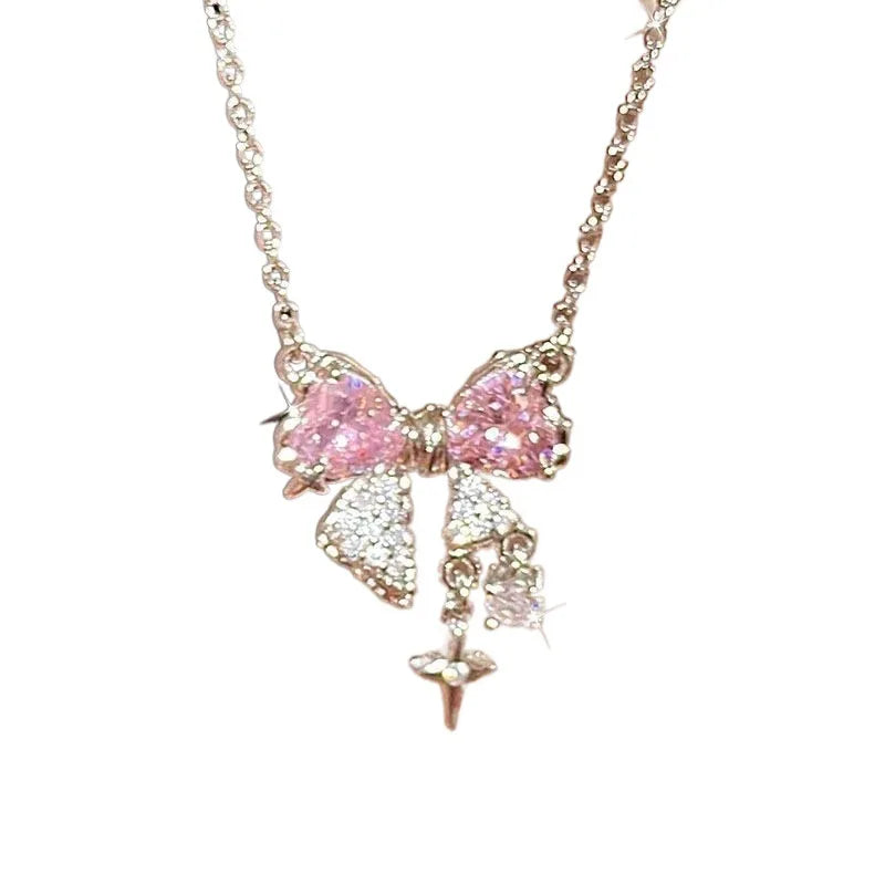 Luxe Pink Bow Pendant Necklace – Dainty Star Detail on Sparkling Chain