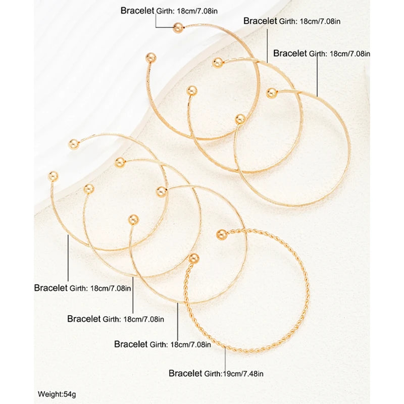 Vesper Edge Set – 7-Piece Gold-Tone Streetwear Bangles