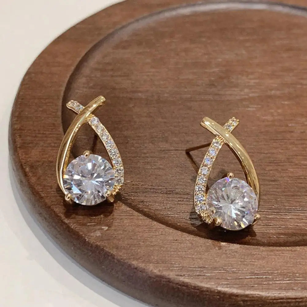 ELEGANT SHINE CROSS STUD Earrings