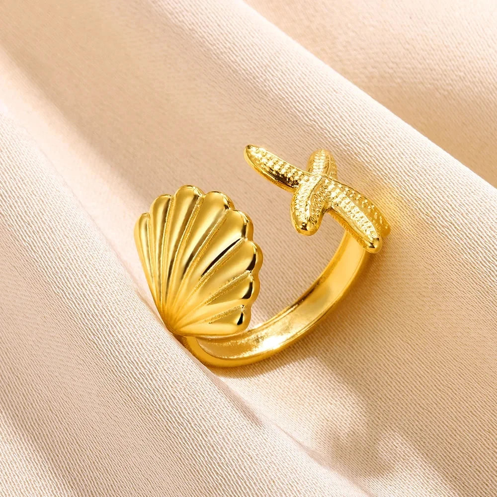Stella Nova Rings – Adjustable Gold-Tone Stainless Steel with Star & Shell