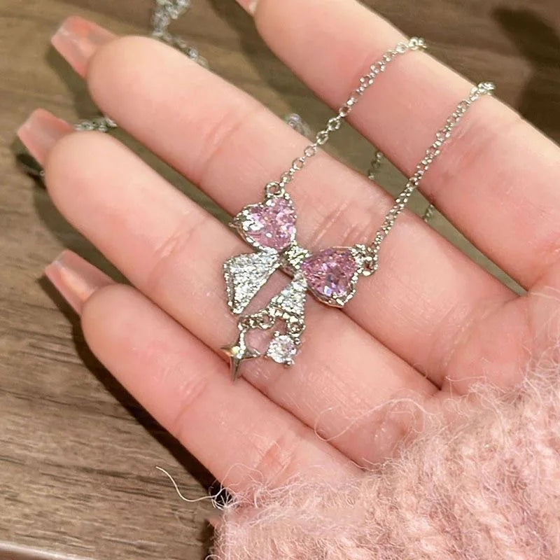 Luxe Pink Bow Pendant Necklace – Dainty Star Detail on Sparkling Chain