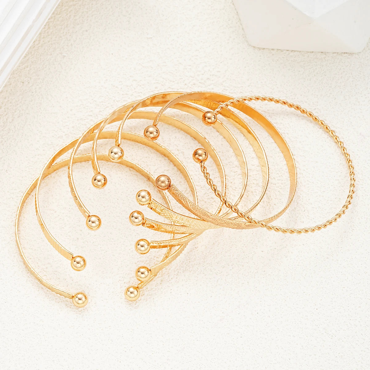 Vesper Edge Set – 7-Piece Gold-Tone Streetwear Bangles