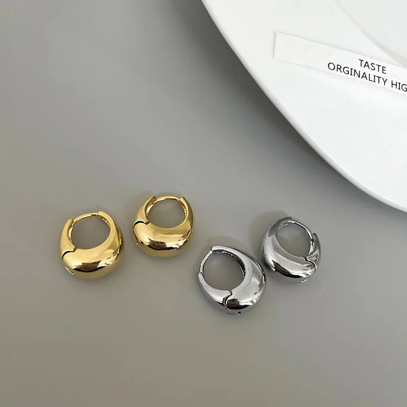 The Obsidian Hoops – Metallic Oval Earrings