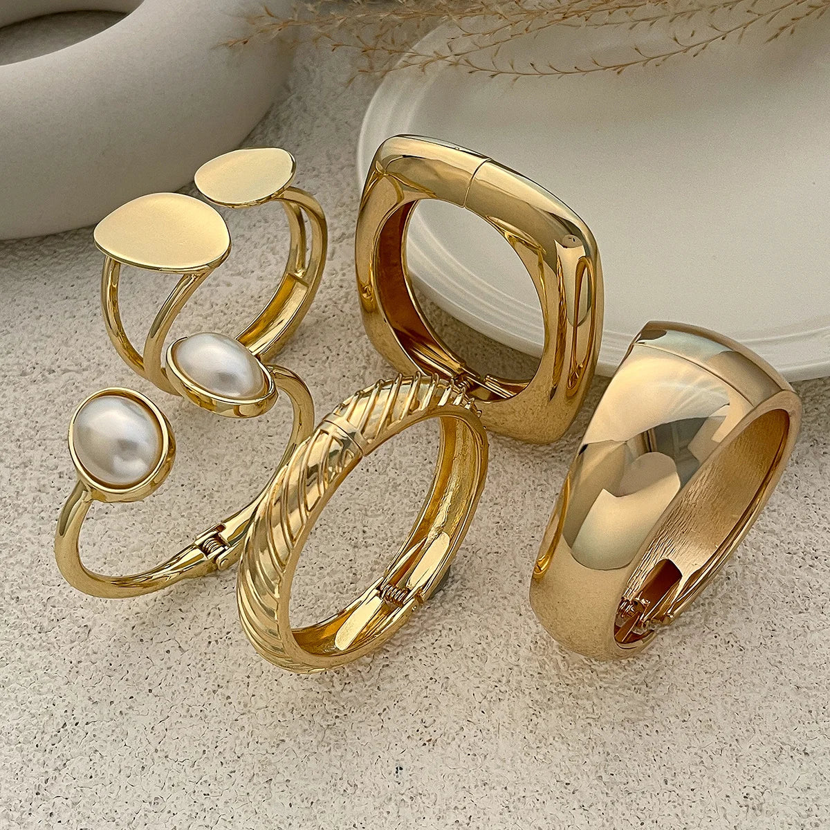 Chunky Gold Spring Bangle – Statement Metal Bracelet