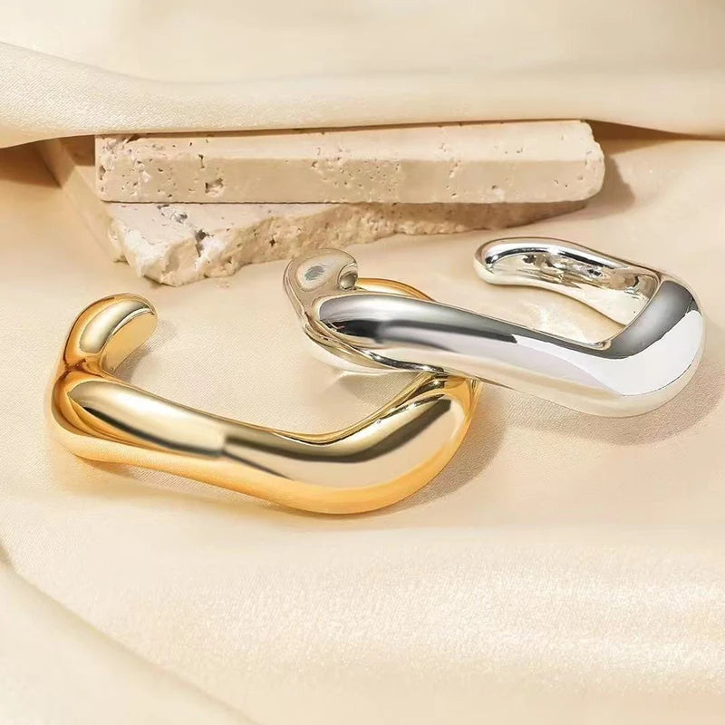 Sculpted Curve Bangle – Bold Irregular Statement Cuff