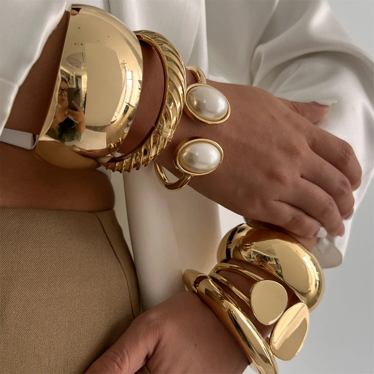 Chunky Gold Spring Bangle – Statement Metal Bracelet