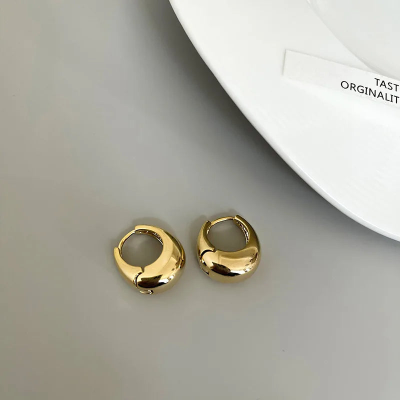 The Obsidian Hoops – Metallic Oval Earrings