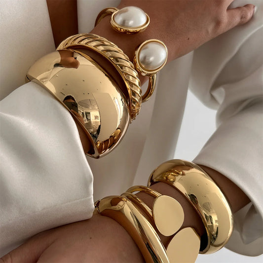 Chunky Gold Spring Bangle – Statement Metal Bracelet