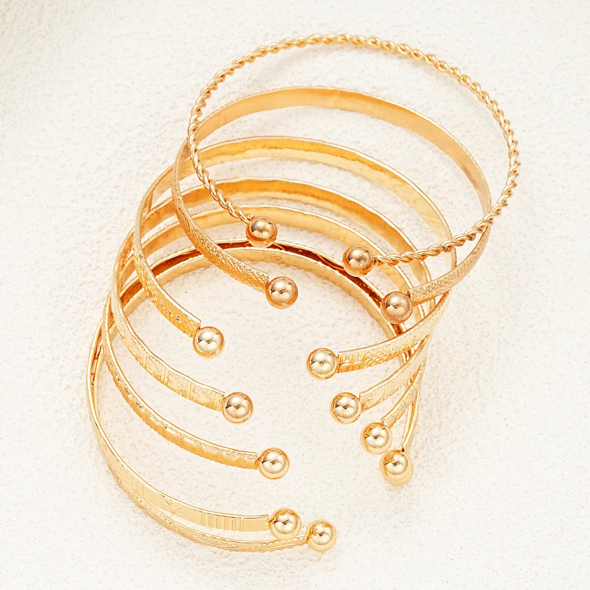 Vesper Edge Set – 7-Piece Gold-Tone Streetwear Bangles